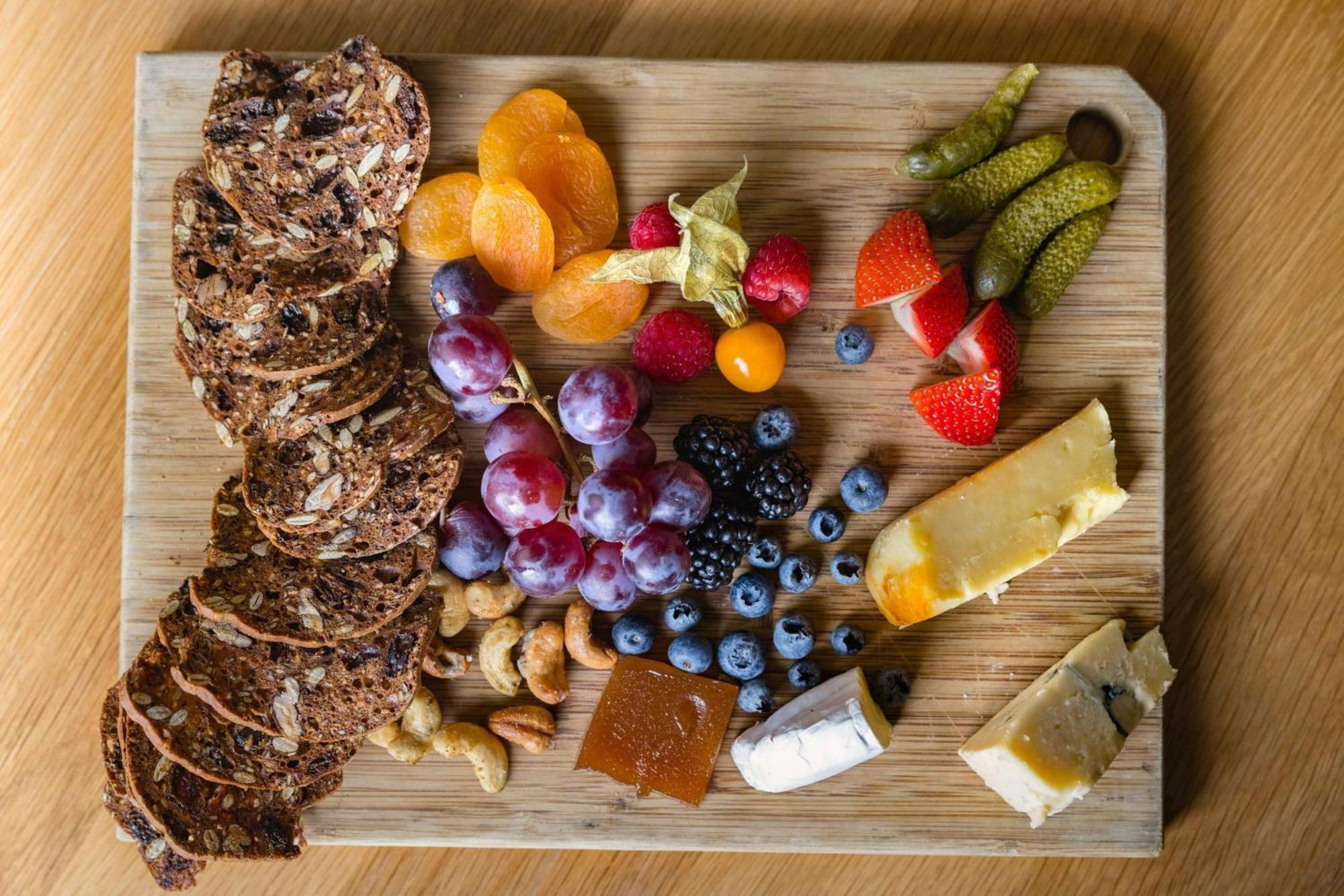 The Westin Resort & Spa, Whistler Exterior foto A cheese board with fruit and crackers